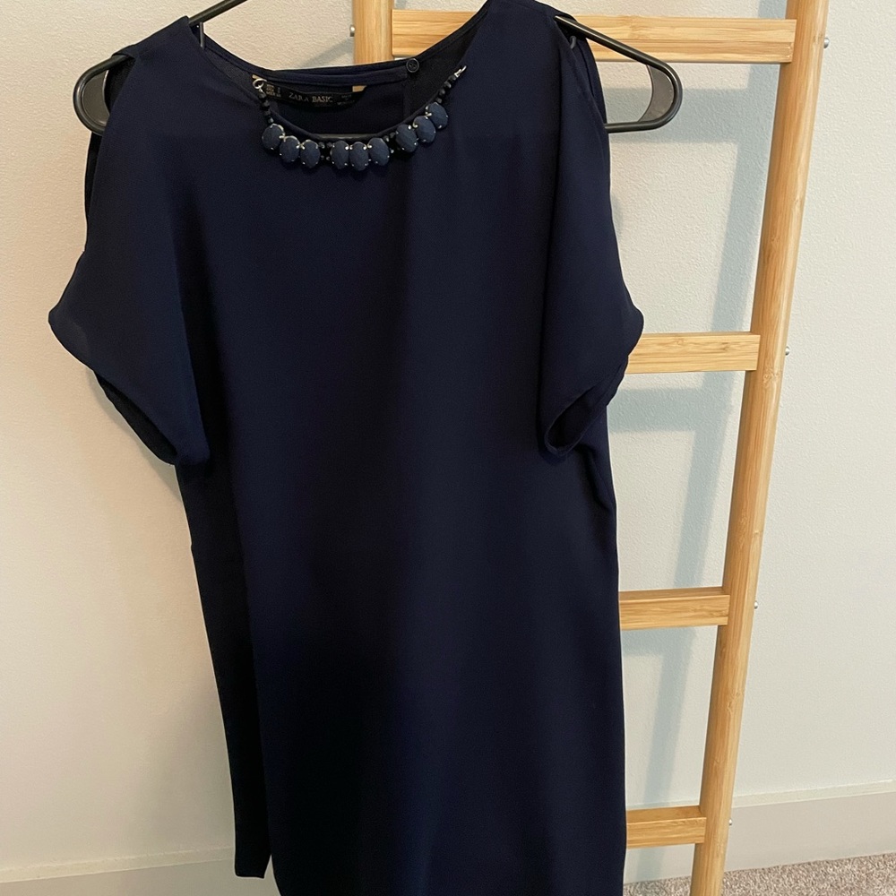 Zara dress with necklace on the collar